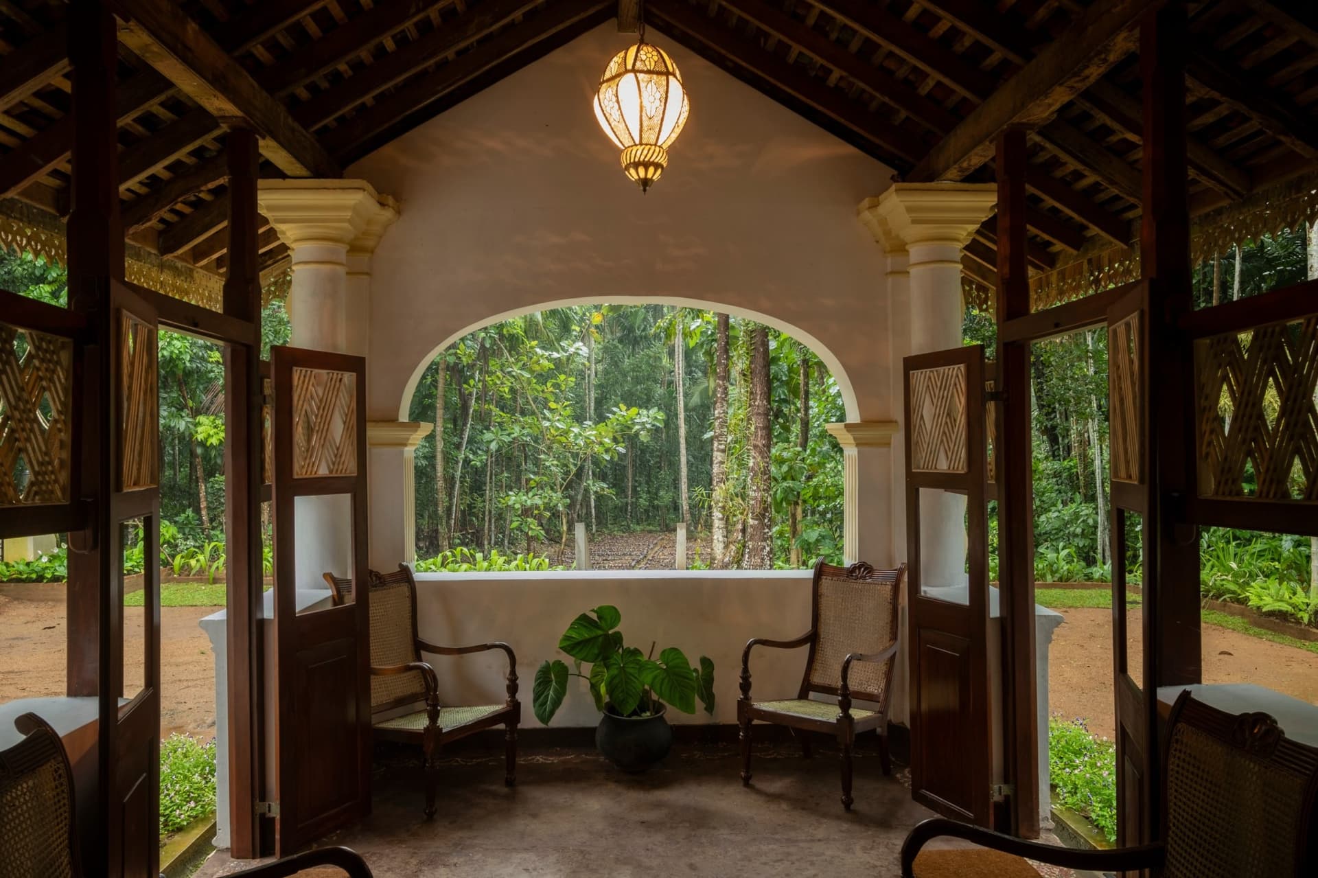 Quiet moment on a veranda, garden shade, coastal air, unhurried presence